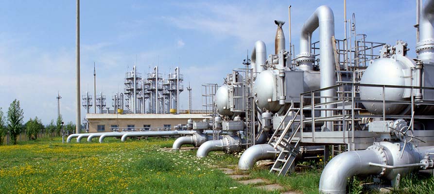 A skid-mounted LNG refueling station including storage tank, transfer